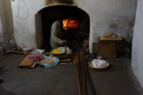 He bakes bread for anyone who brings it to him oven ready!